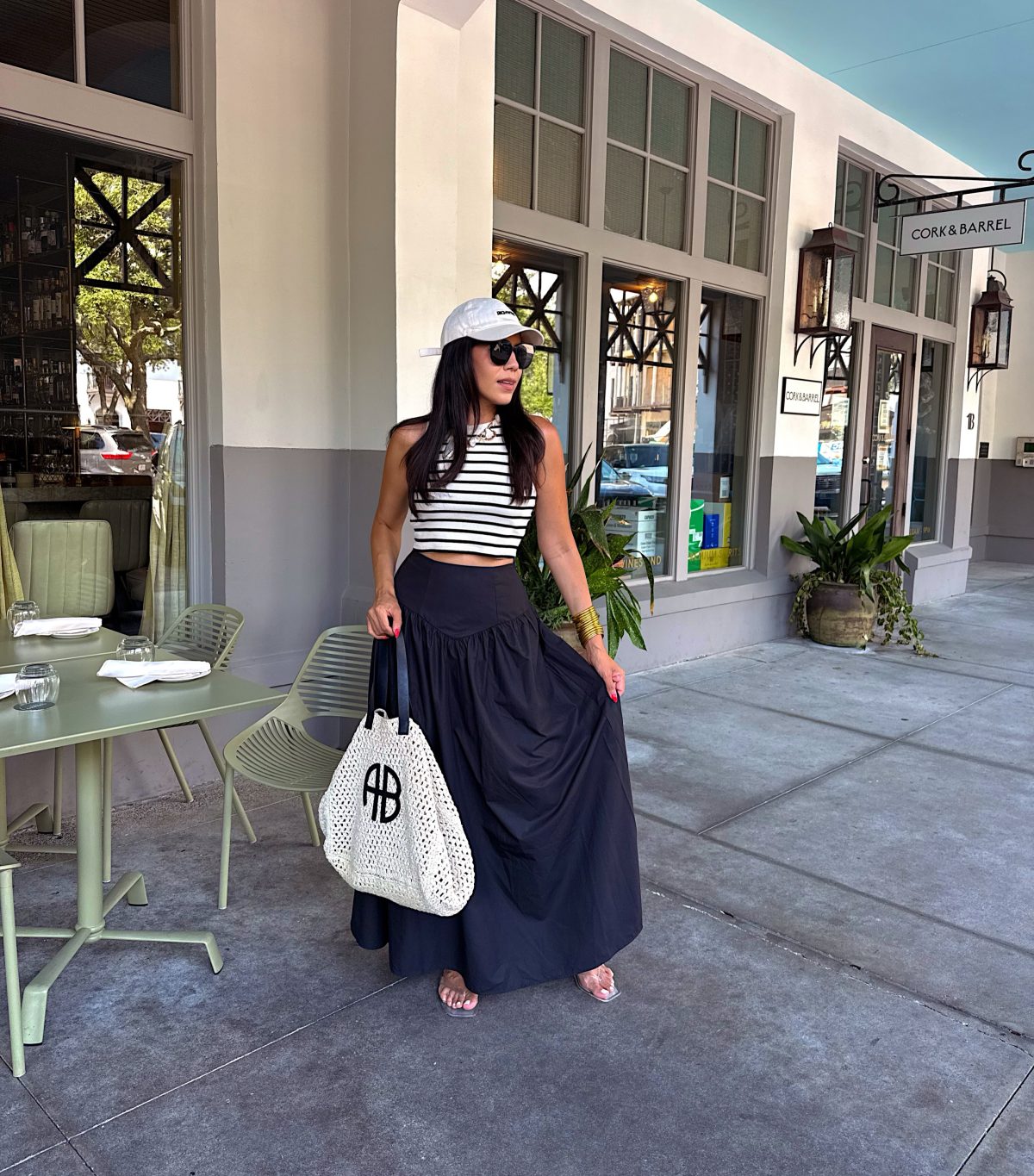 A Striped Crop Top with a Full Black Maxi Skirt for Weekend Lunch